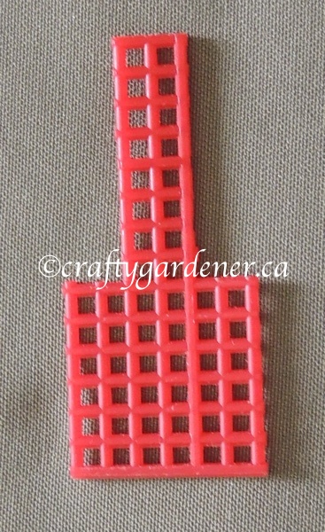 mini fly swatter made from plastic canvas from craftygardener.ca