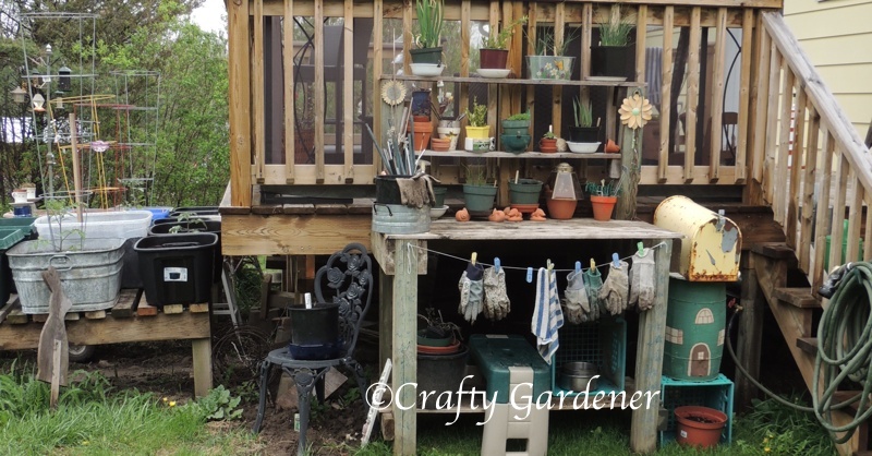 the garden workbench made from recycled deck lumber ... a great place for working outside