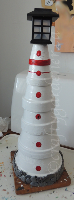 making a clay pot lighthouse at craftygardener.ca
