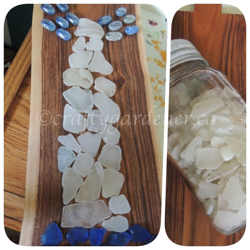 a lighthouse made with seaglass at craftygardener.ca