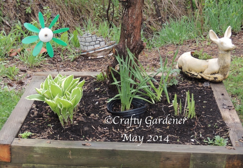 the sign post garden May 2014 - craftygardener.ca